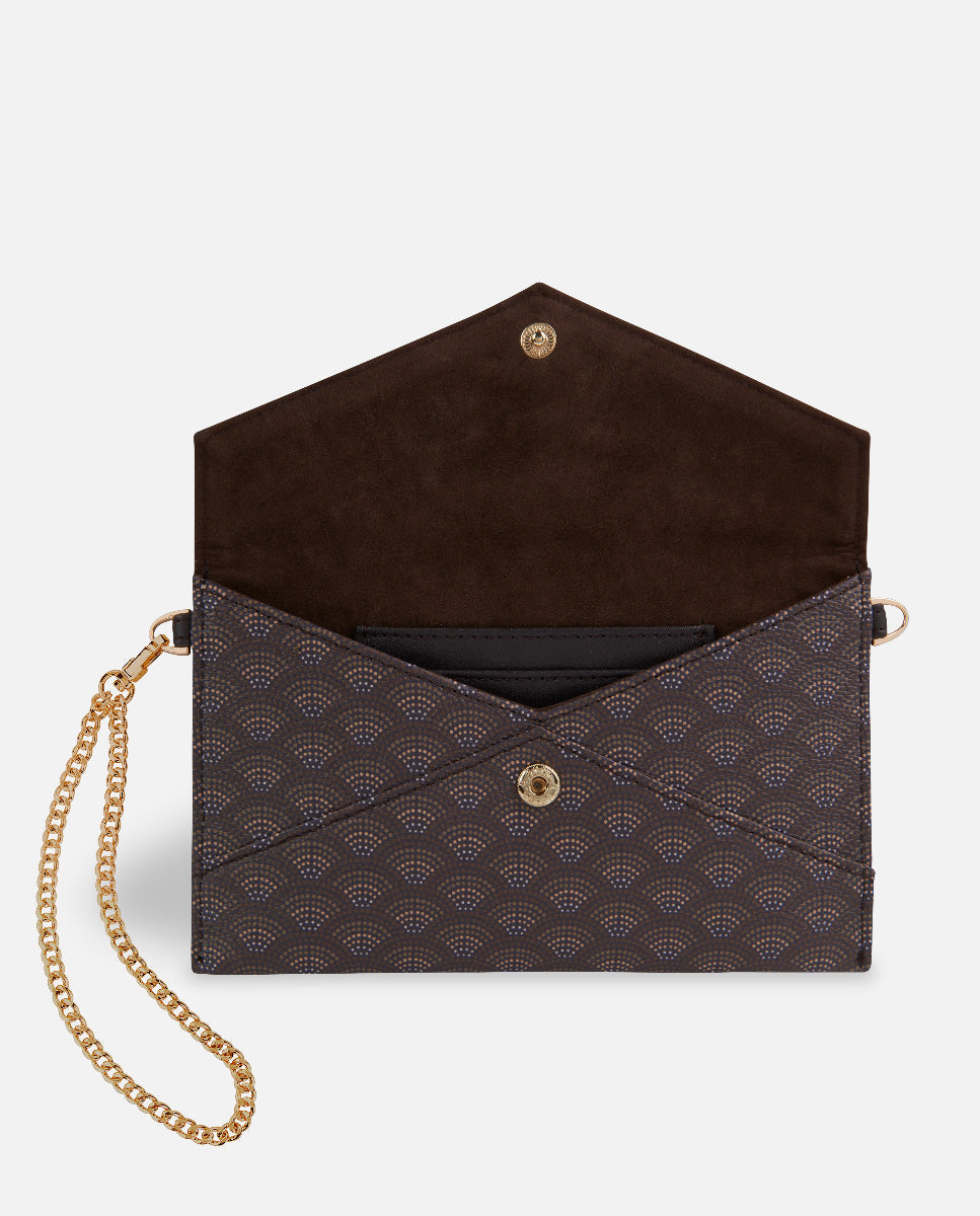 Women's open brown printed wallet with gold-colored bracelet